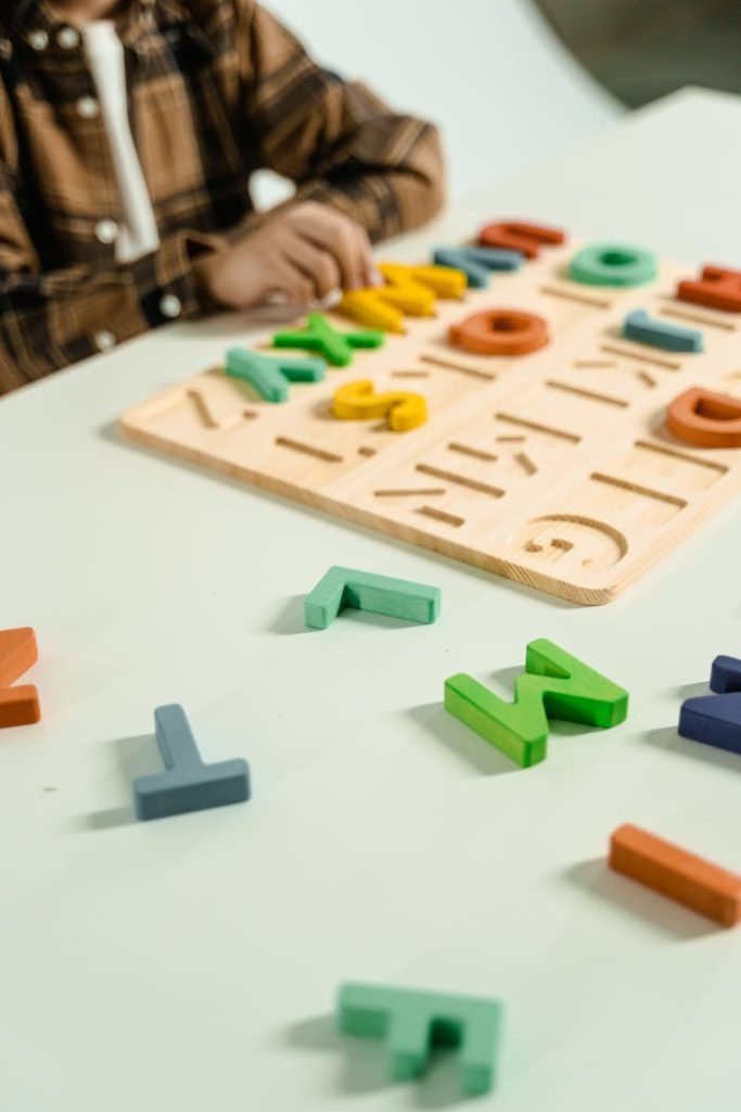 Colorful wooden alphabet letters for preschool childrens learning and creativity.